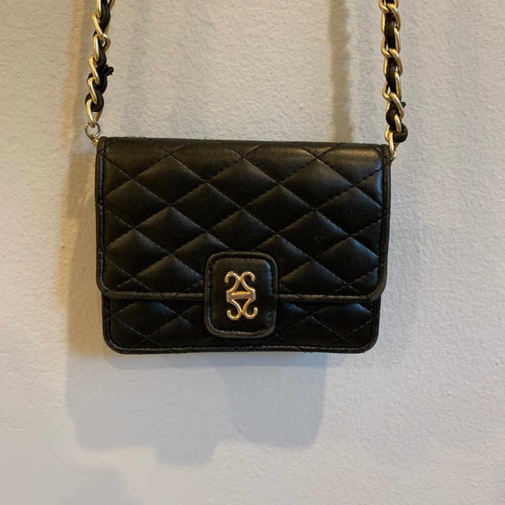 Small black and gold satchel